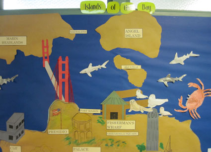 Student-made wall map with ocean and land