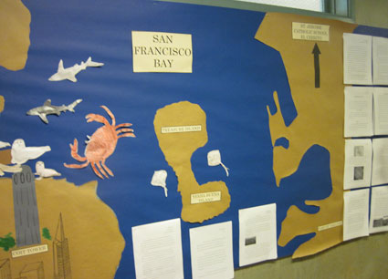 Student-made wall map with ocean and land